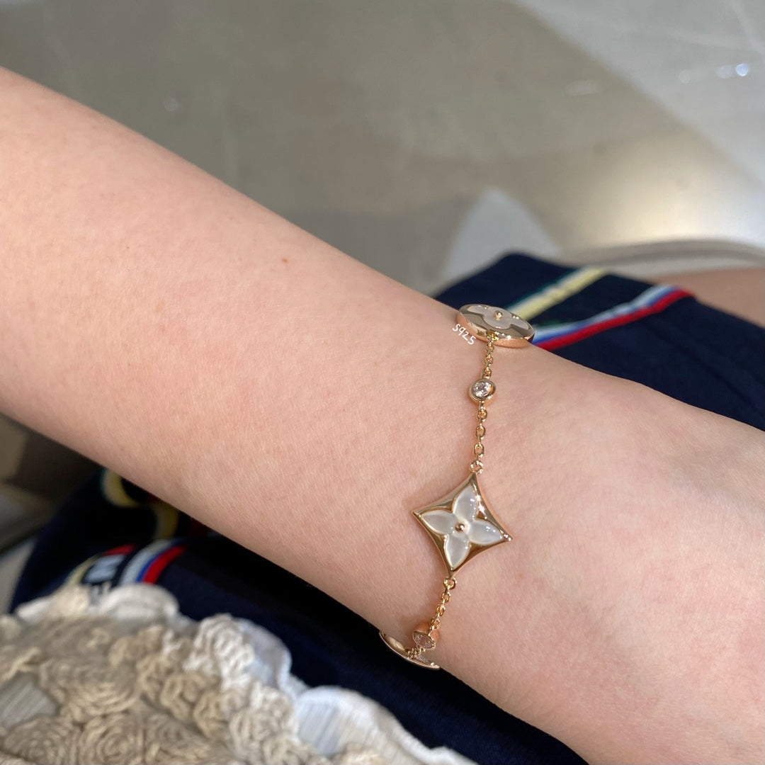 [⭐Renara]STAR AND SUN 4 MOTIF WHITE MOP PINK GOLD BRACELET